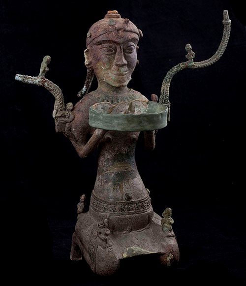 Bronze lamp in the shape of a kneeling man